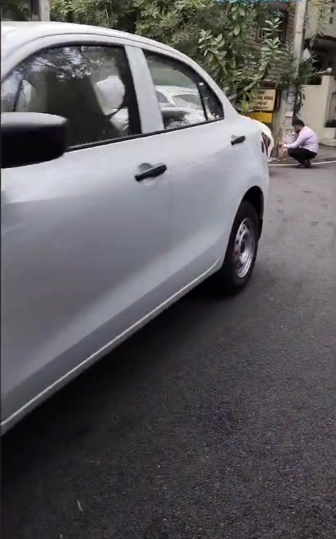 Side view of a white sedan