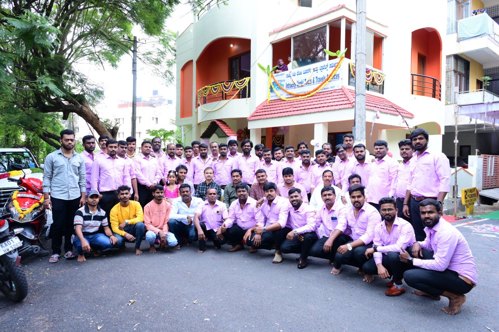 Intracity Venki team in uniform in front of the office